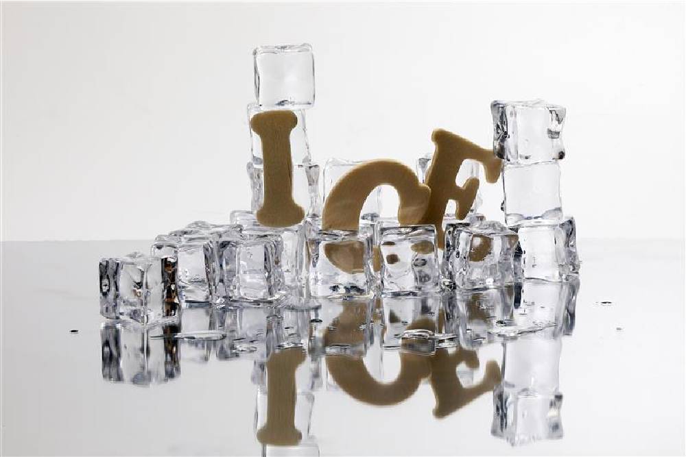 A pile of clear, cubed ice slowly melts, one of the many different types of ice that can affect your beverages. The word “Ice” falls as the pile of cubes melt. A pile of clear, cubed ice slowly melts, one of the many different types of ice that can affect your beverages. The word “Ice” falls as the pile of cubes melt.